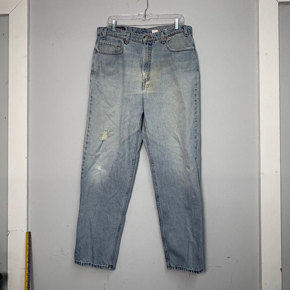 Vintage Levis 550 Relaxed Fit Light Wash Distressed Jeans Mens 36x32 Blue 90s
